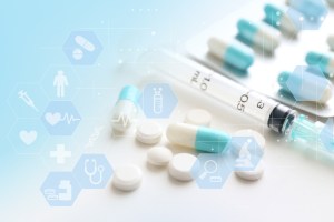 Pills and a syringe.